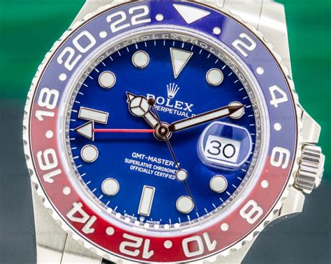 rolex gmt ii pepsi blue dial|rolex gmt pepsi holes.